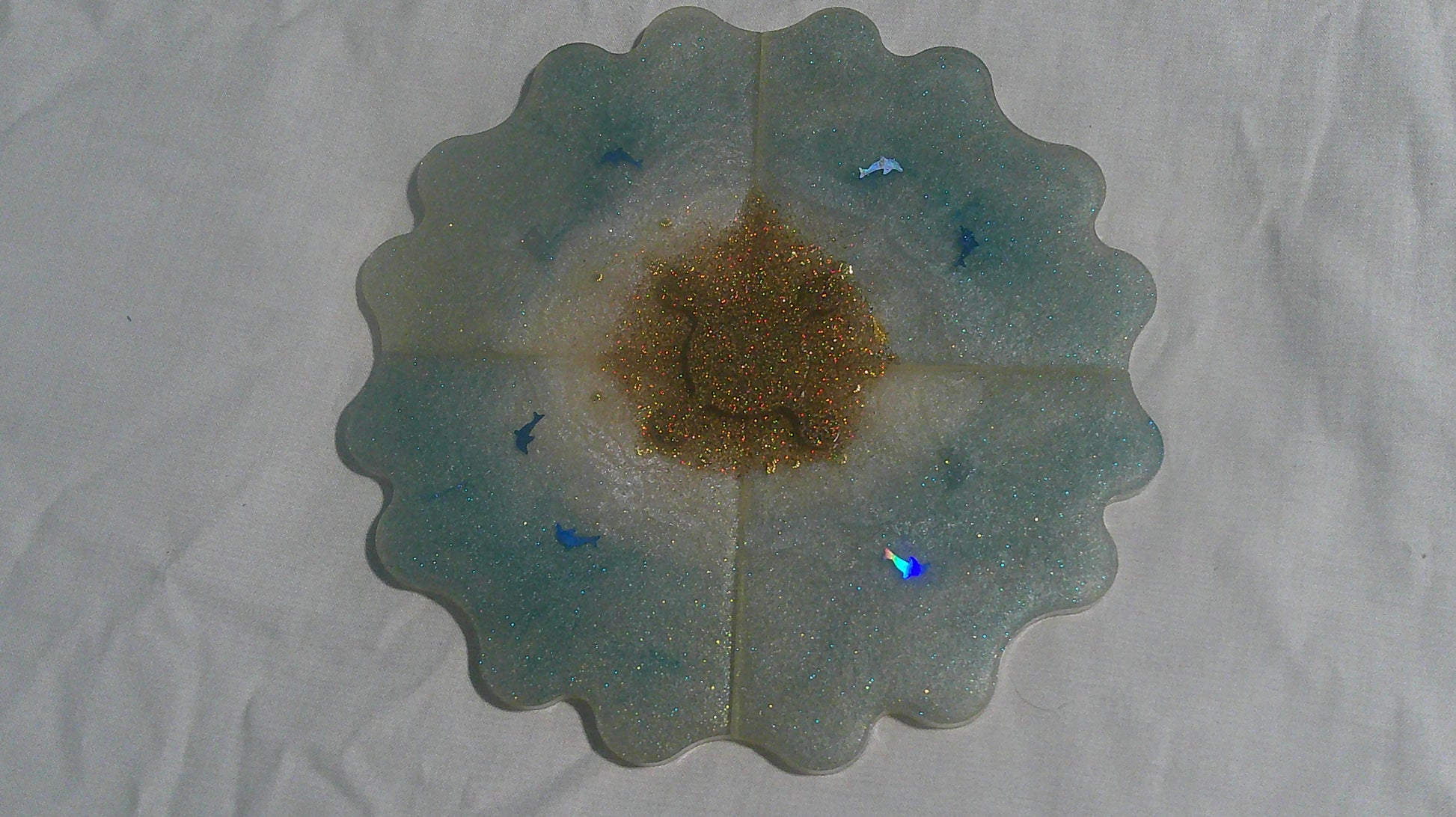 Dolphin puzzle coaster assembled - top view