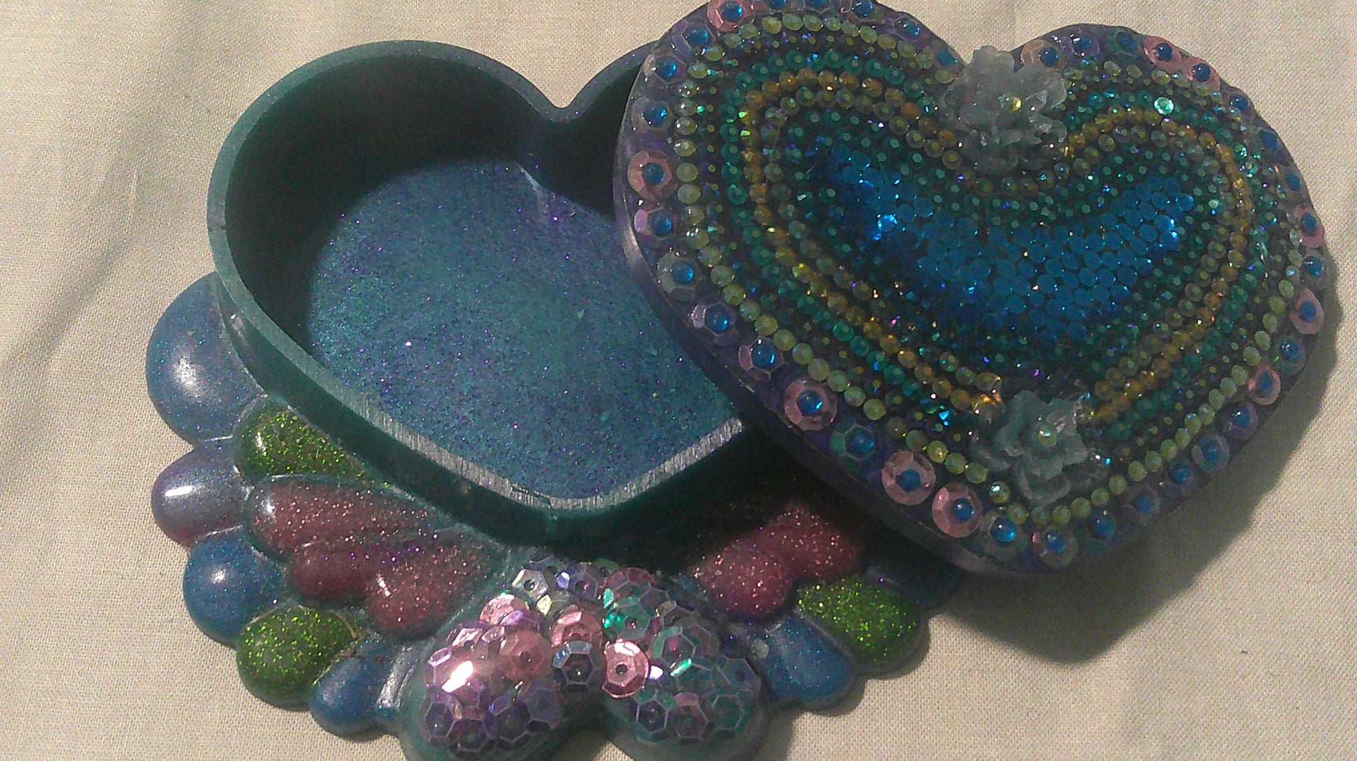 Handmade resin mermaid heart jewellery box - side angle view