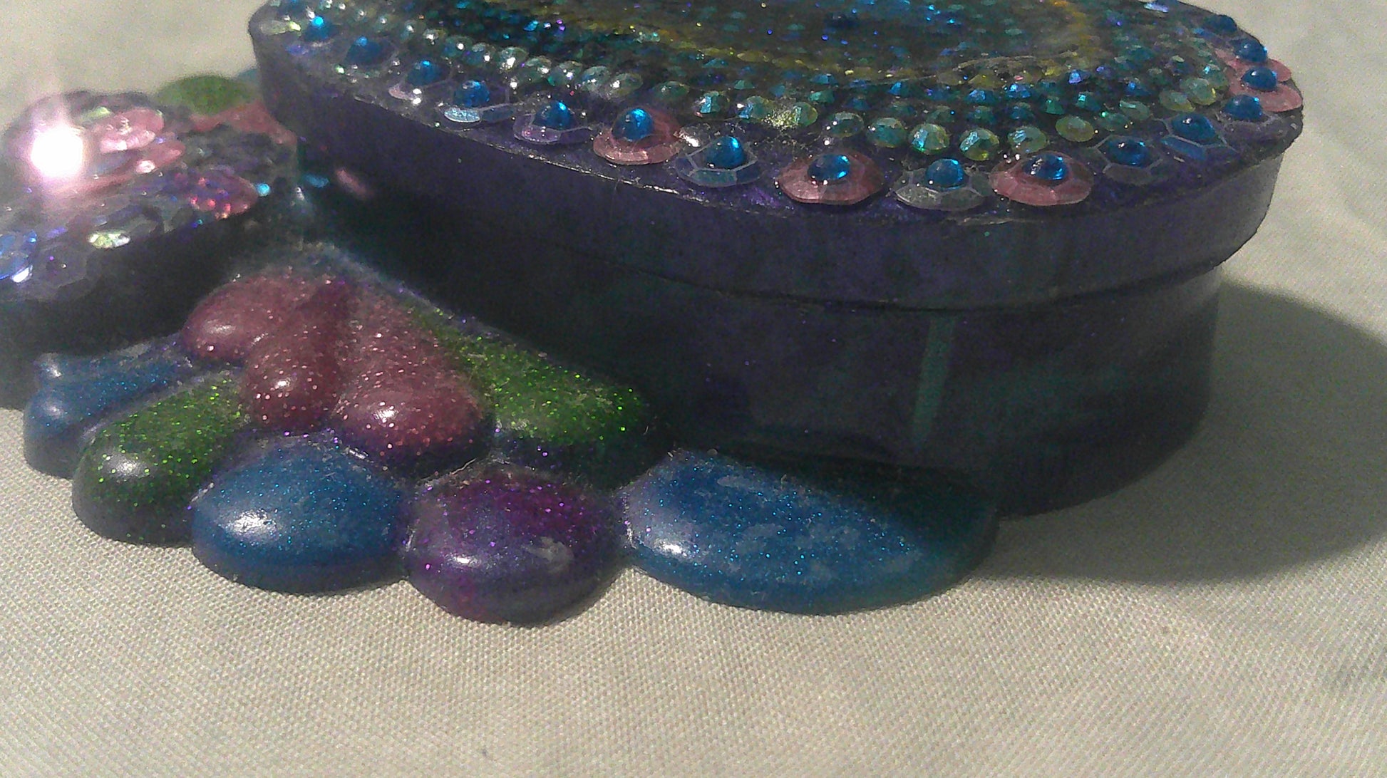 Handmade resin mermaid heart jewellery box - side profile view
